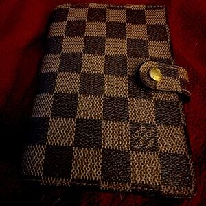 Authentic Louis Vuitton notebook, perfect condition; I don’t ever use